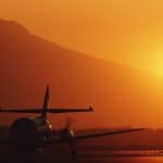 picture of airplane on runway during sunset illustrating Aerospace spot welding applications