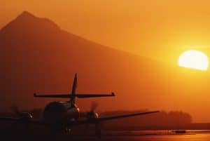 picture of airplane on runway during sunset illustrating Aerospace spot welding applications 